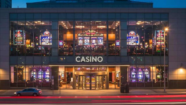 Illuminated casino entrance at night