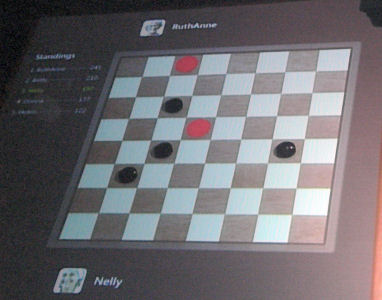 The Surface tabletop can recognize the shape and weight of checkers as opposed to fingertips.