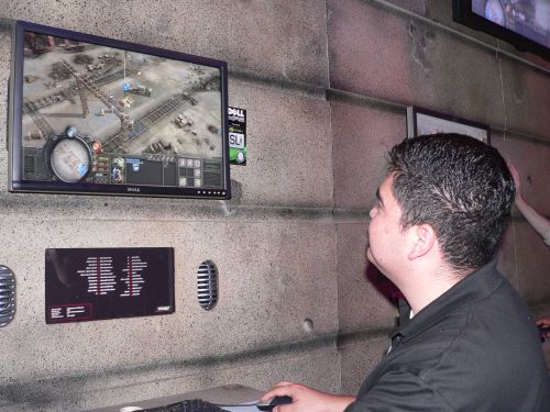 A THQ representative demonstrating 'Company of Heroes' at the final E3 Expo in 2006.