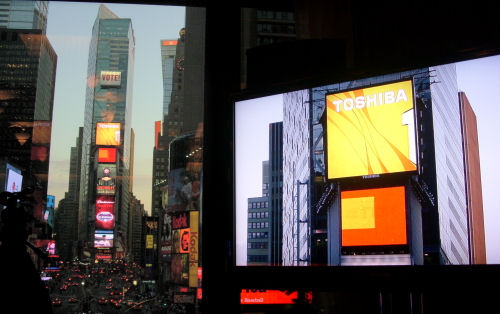 The Toshiba HD LED sign in Times Square is juxtaposed against a close-up shot, to the right, of the same display from Toshiba's HD camera.