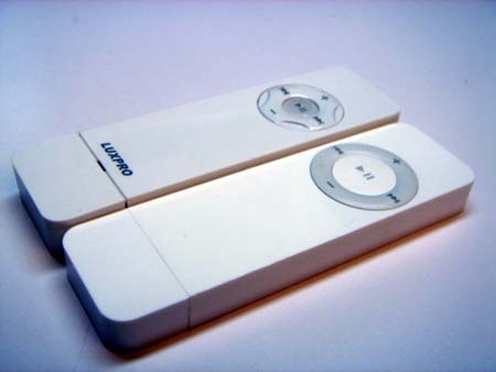 Luxpro Super Tangent (nee Super Shuffle) next to a first-gen iPod Shuffle