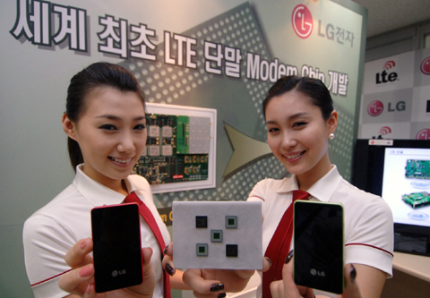 Representatives from LG Electronics show off their new LTE chipset for handsets and mobile devices, at a trade event in South Korea.