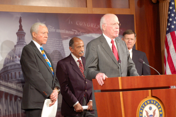 Left to right, Sen. Orrin Hatch (R - Utah), Rep. John Conyers (D - Mich.), Sen. Patrick Leahy (D - Vt.), and Rep. Lamar Smith (R - Tex.)., reintroducing the Patent Reform Act of 2009, March 3.